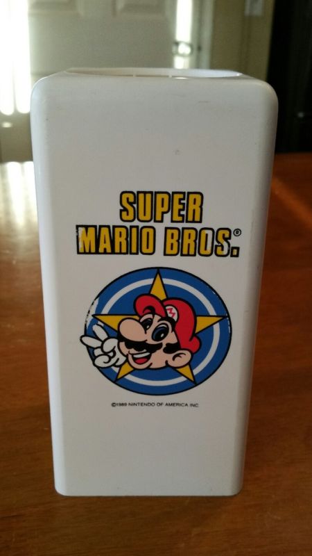 A cup dispenser with the Super Mario logo on it